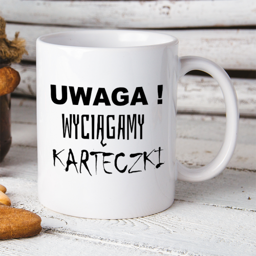 Kubek z nadrukiem wyciągamy...